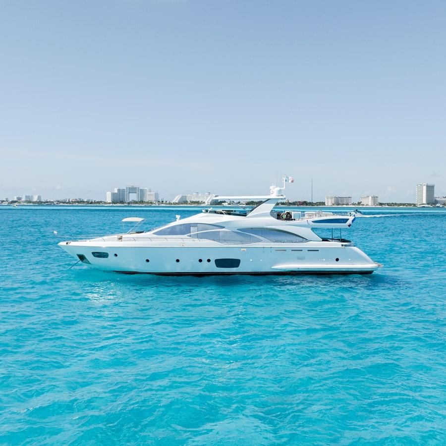 a white yacht in the water aboard V&V Yacht for Sale