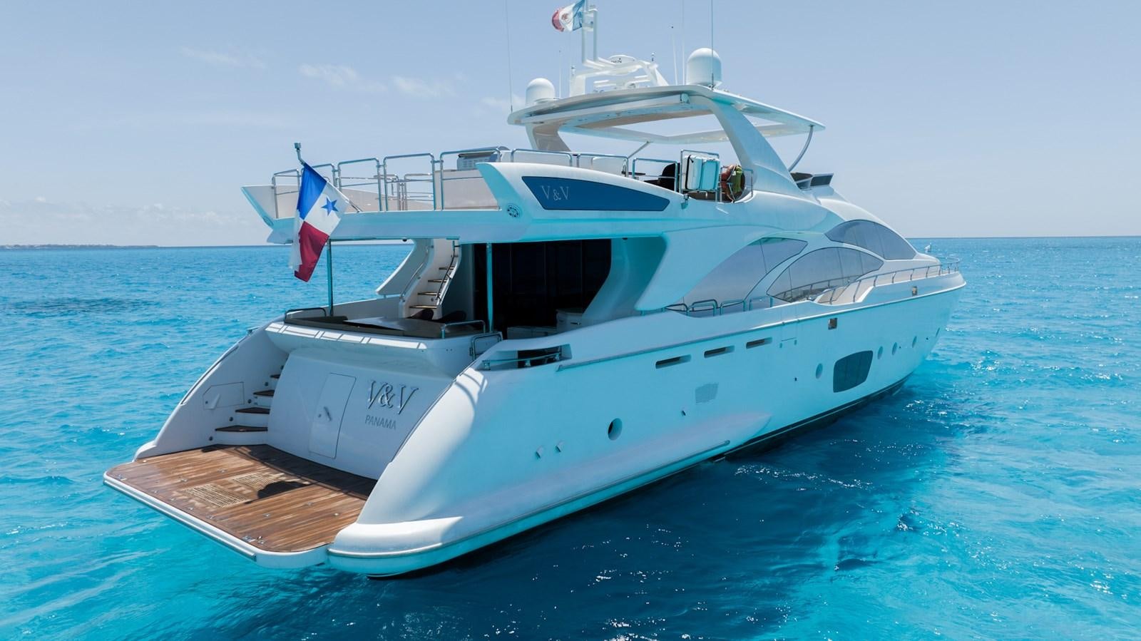 a white boat on the water aboard V&V Yacht for Sale