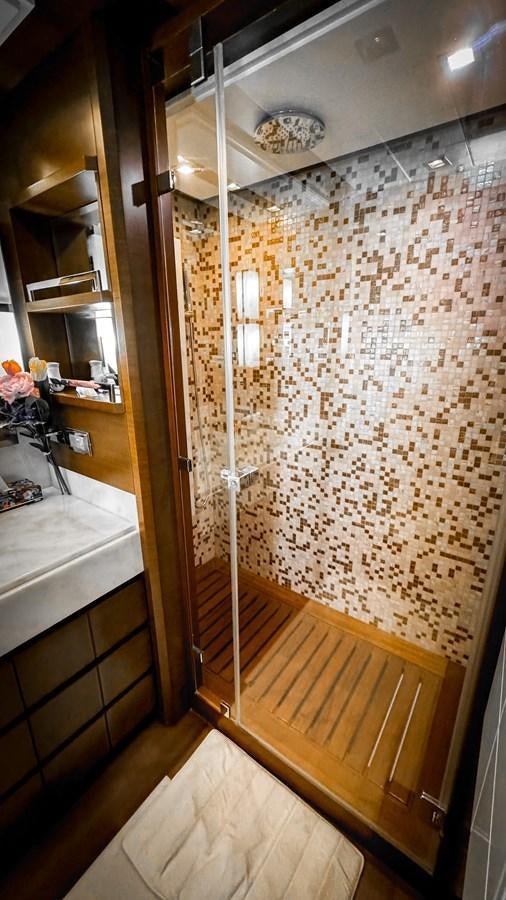 a shower unit in a bathroom aboard V&V Yacht for Sale