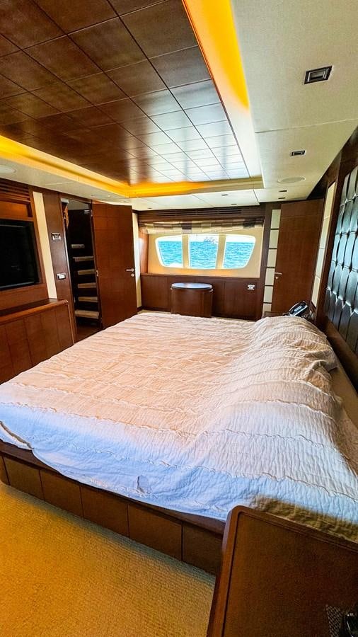 a bed in a room aboard V&V Yacht for Sale
