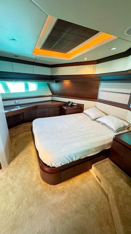 a bed in a room aboard V&V Yacht for Sale