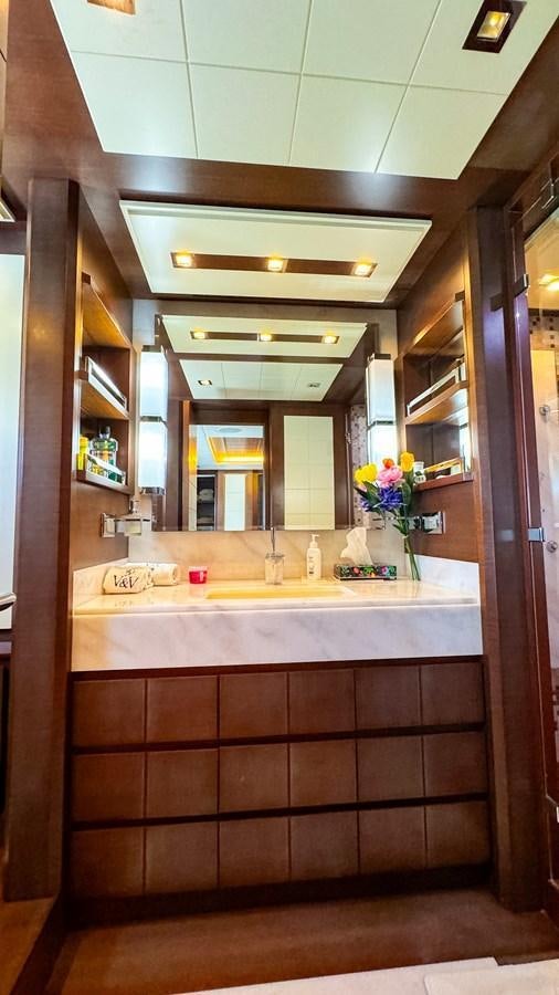 a bathroom with a sink and a mirror aboard V&V Yacht for Sale