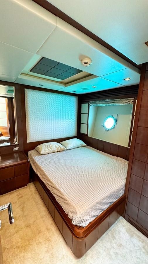 a bed in a room aboard V&V Yacht for Sale