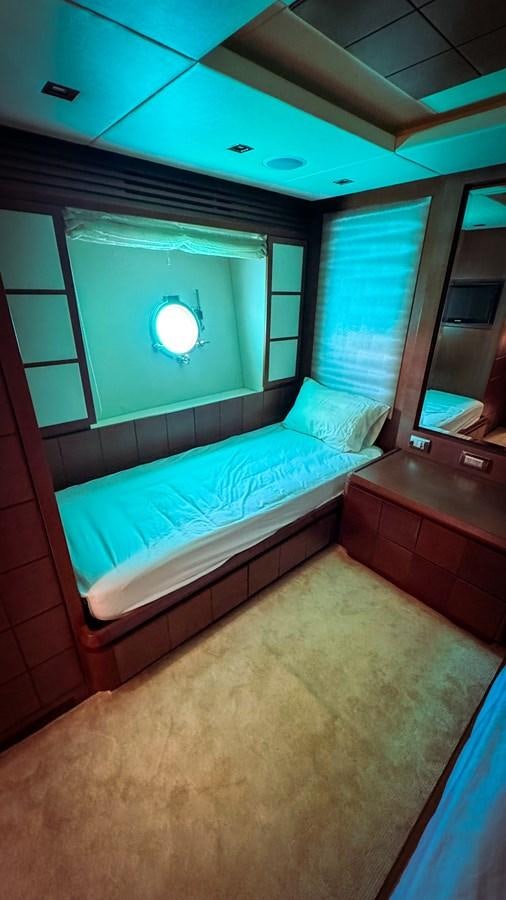 a bed in a room aboard V&V Yacht for Sale
