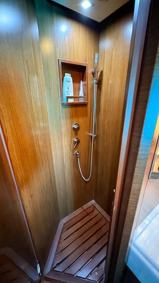 a door with a mirror on the wall aboard V&V Yacht for Sale