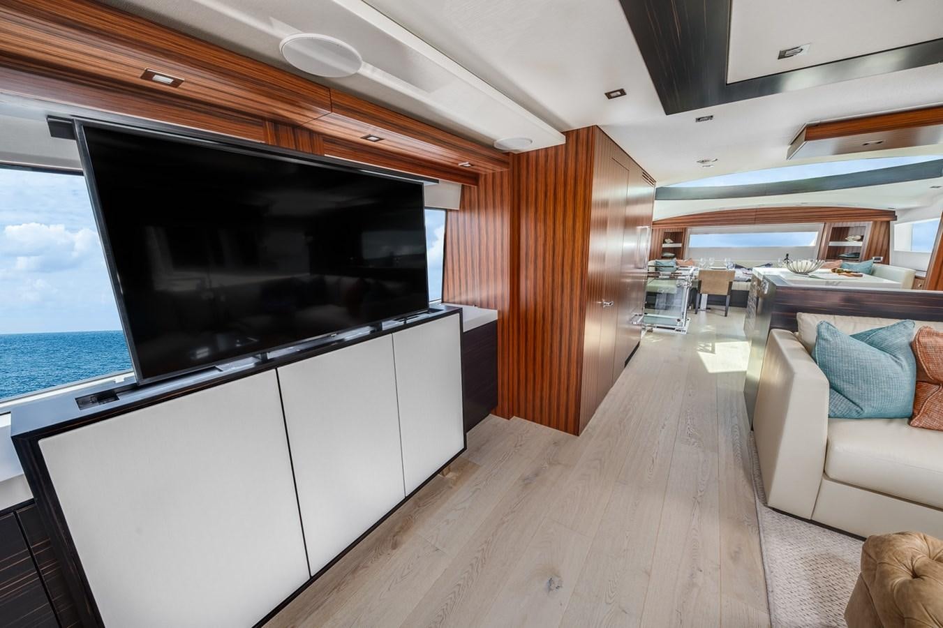 a large kitchen with a large tv aboard LATITUDES Yacht for Sale