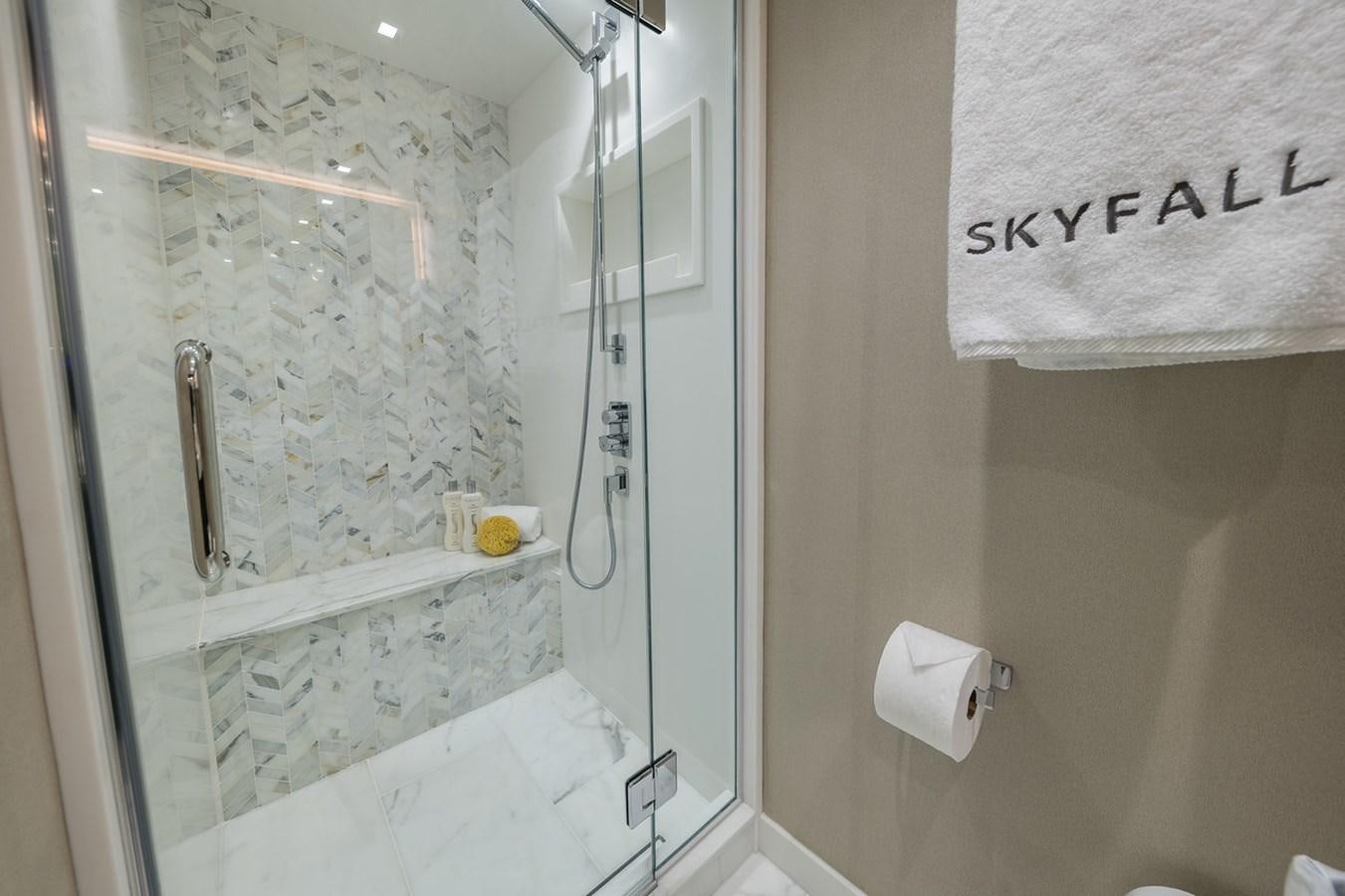 a shower with a glass door aboard LATITUDES Yacht for Sale