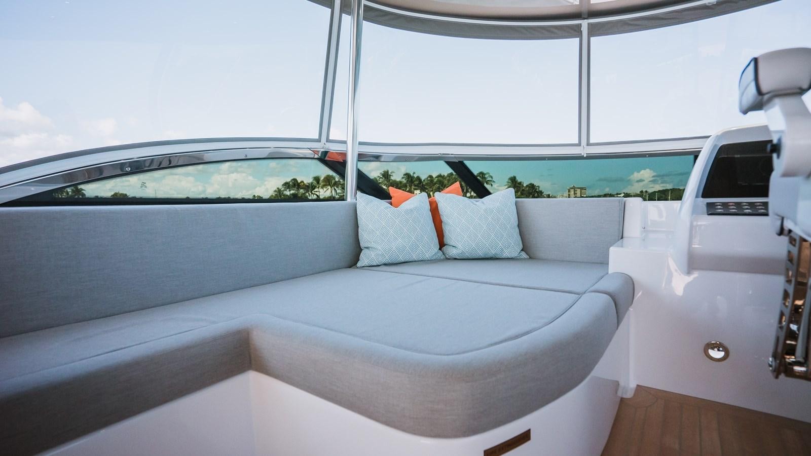 a white bed with a white mattress aboard LATITUDES Yacht for Sale