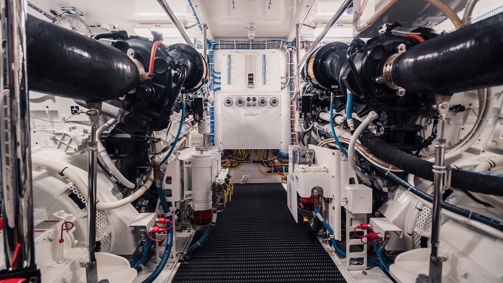 a machine with a large black pipe aboard LATITUDES Yacht for Sale