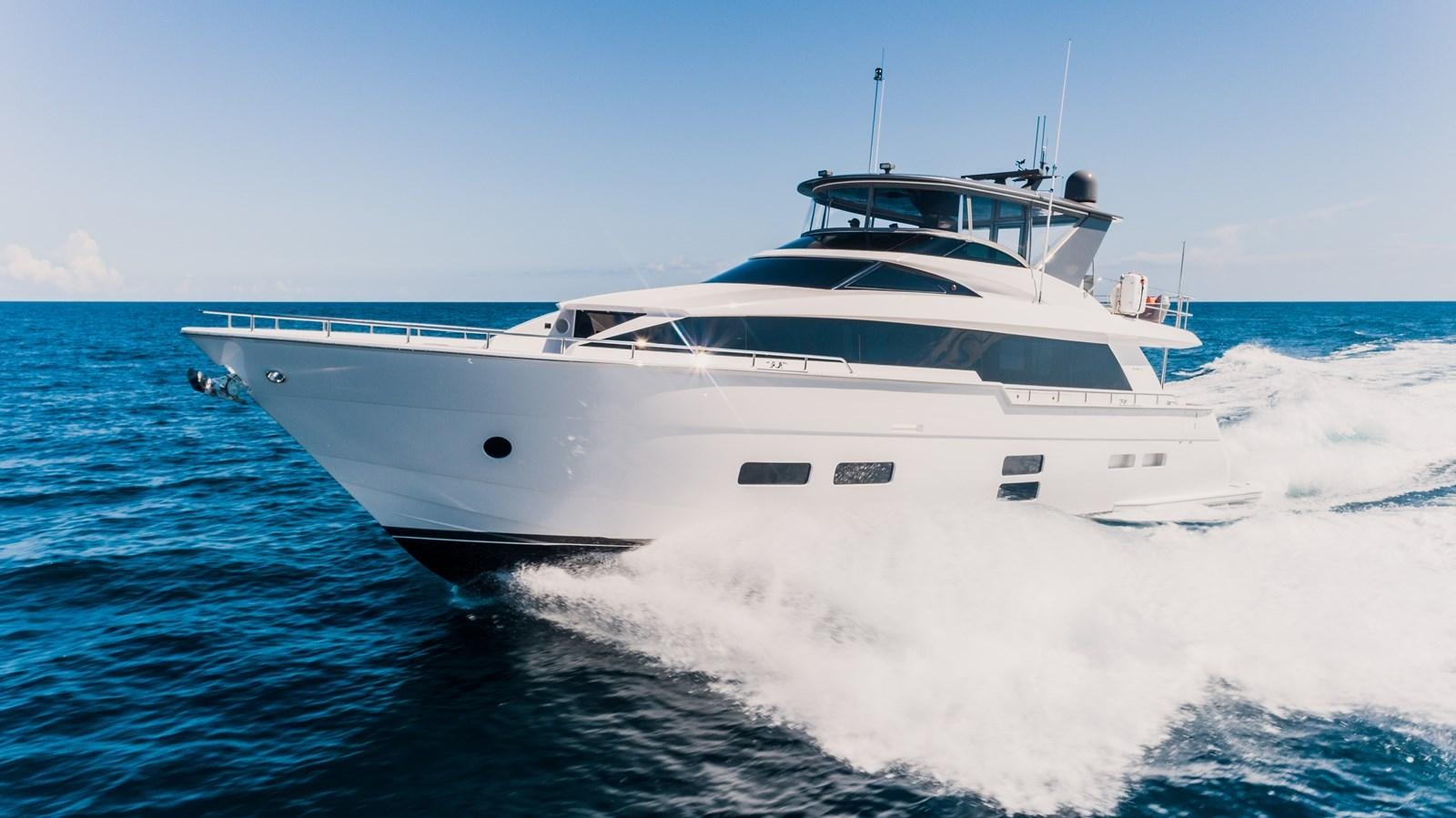 a white yacht on the water aboard LATITUDES Yacht for Sale