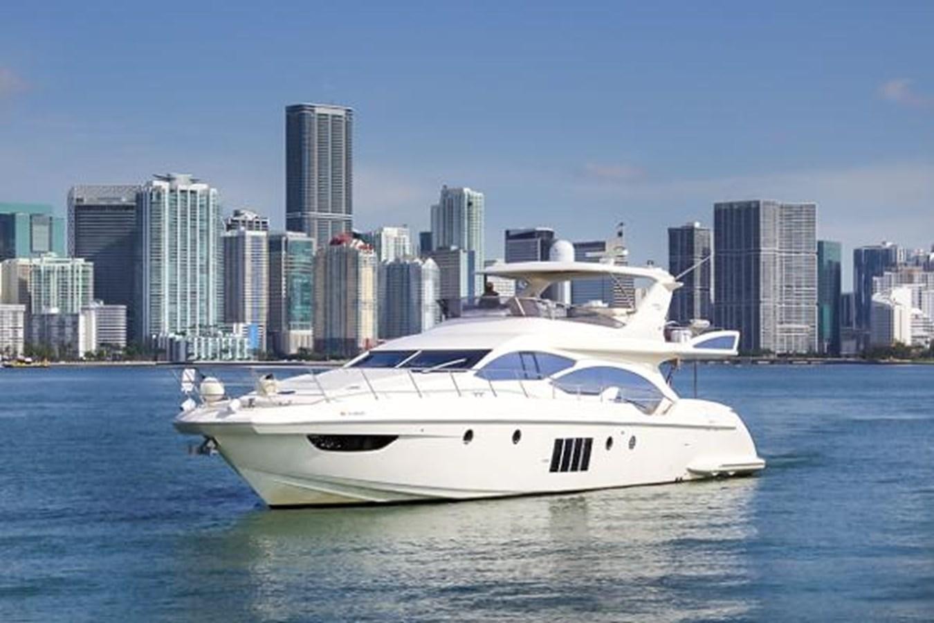 a white yacht in the water aboard 70 Yacht for Sale