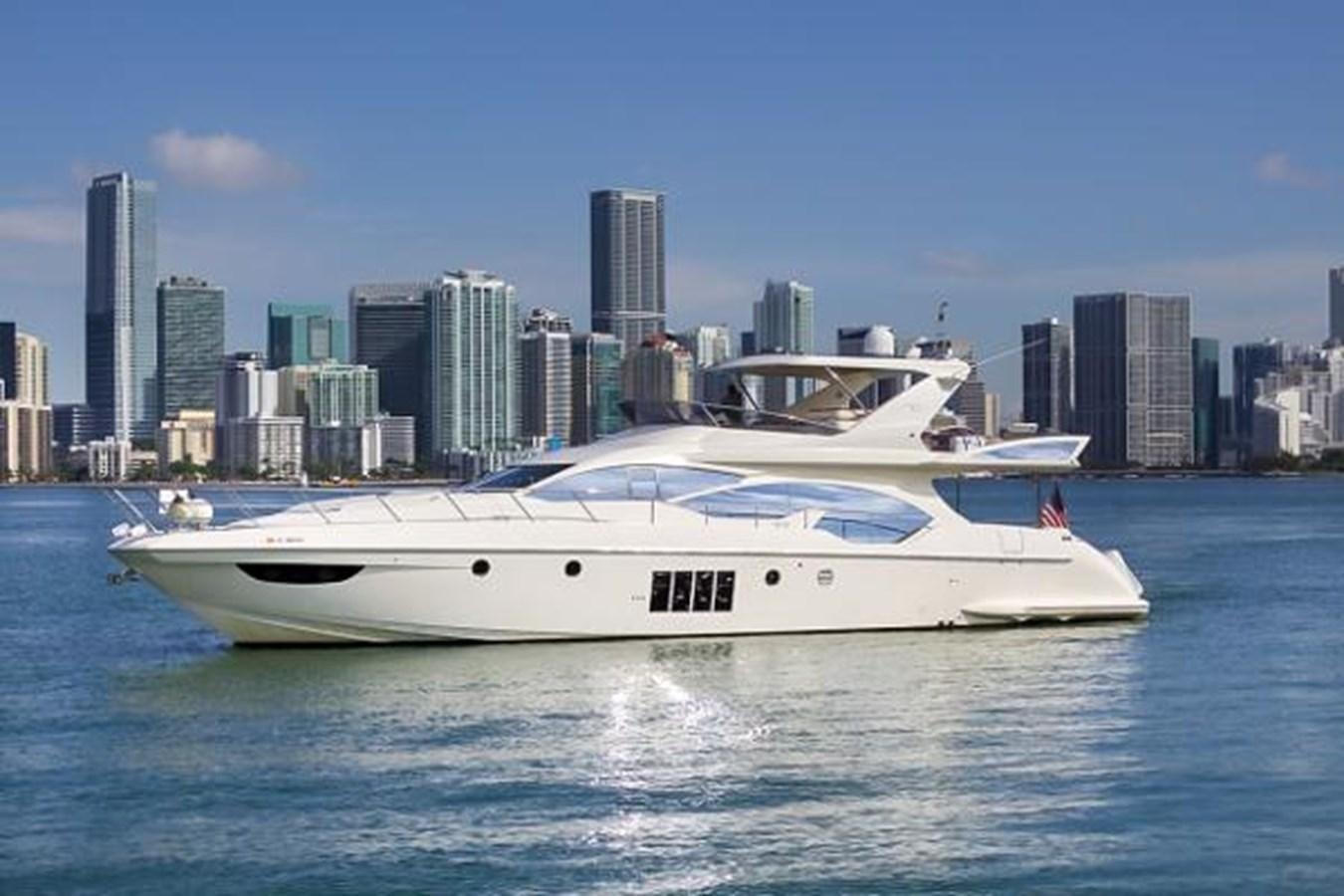 a white yacht in the water aboard 70 Yacht for Sale