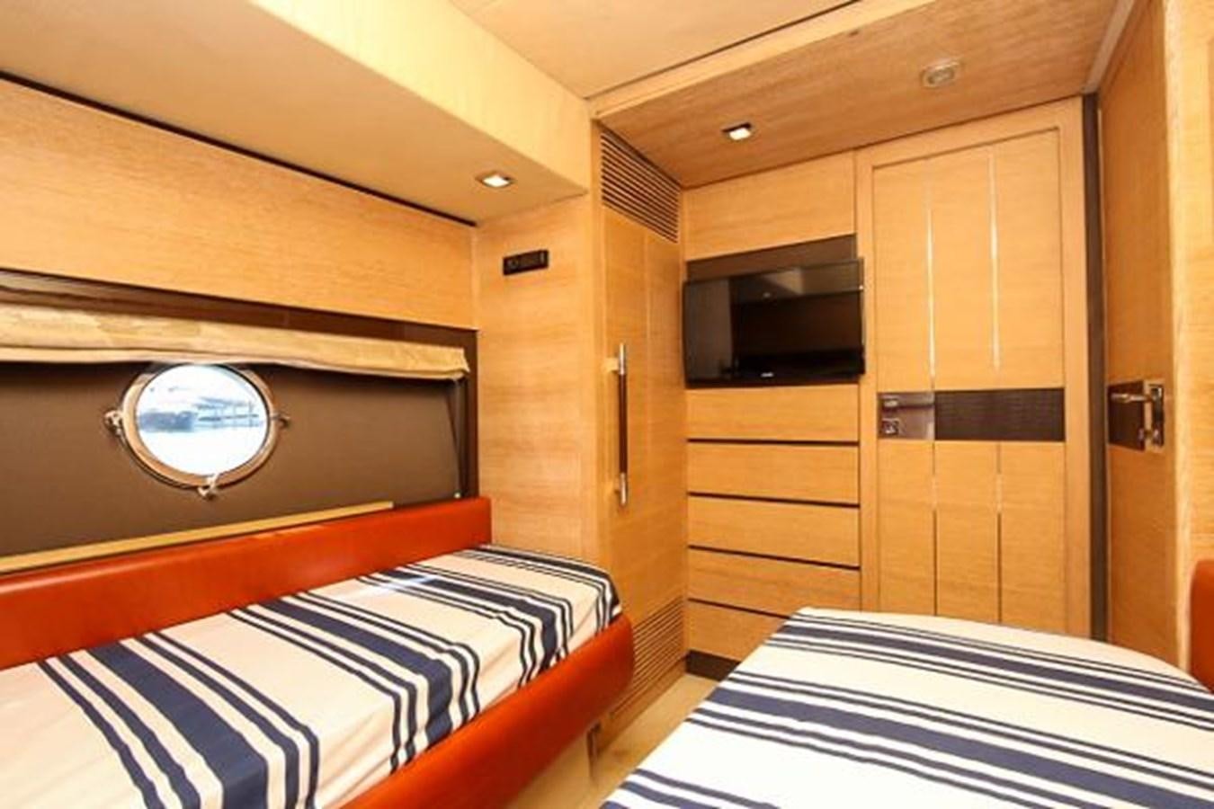a room with a bed and a closet aboard 70 Yacht for Sale