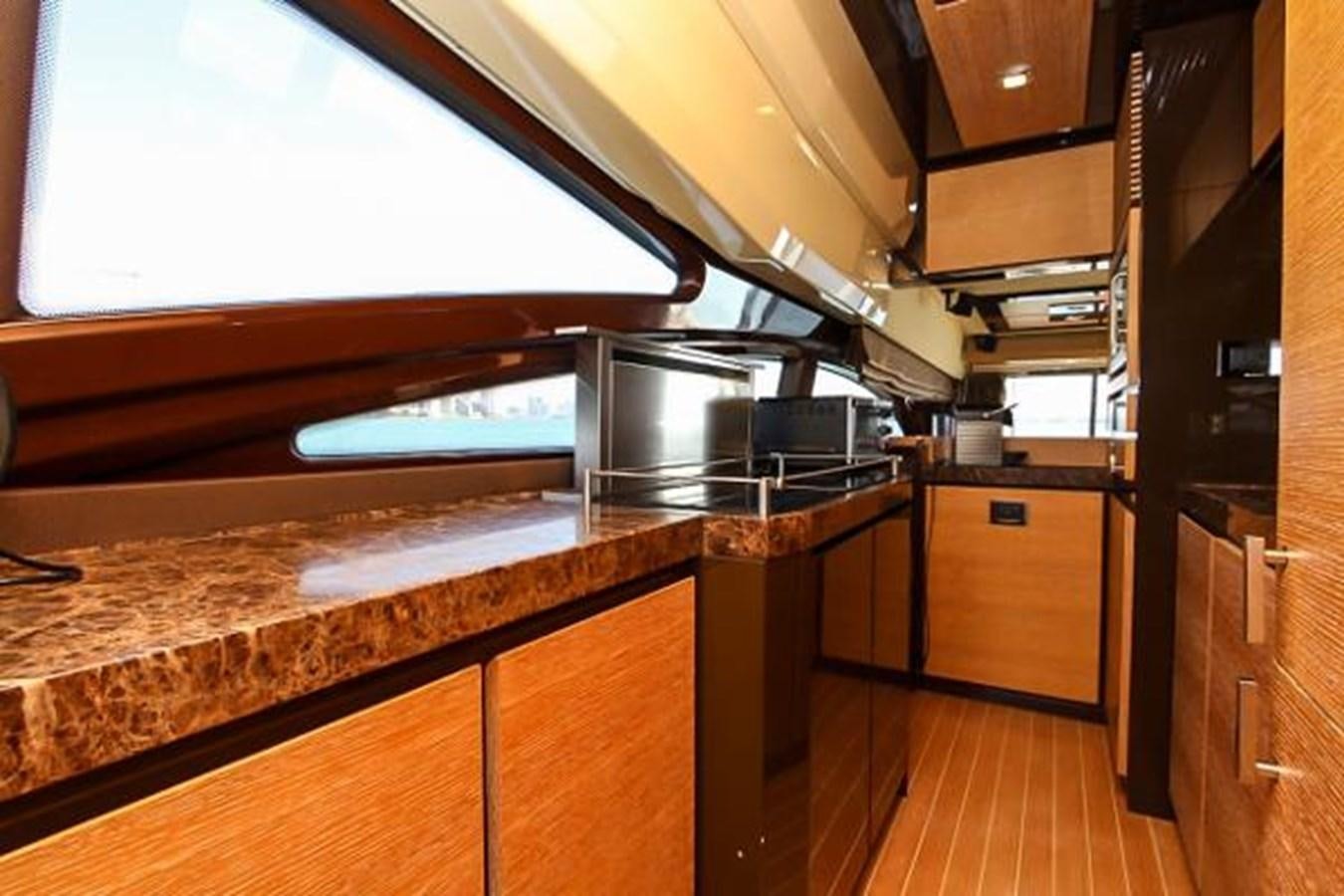 a kitchen with a large oven aboard 70 Yacht for Sale