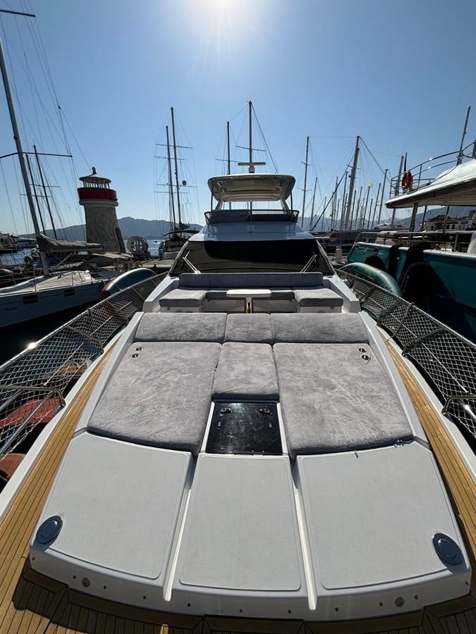 a boat docked at a pier aboard ATLANTIS OF LONDON Yacht for Sale