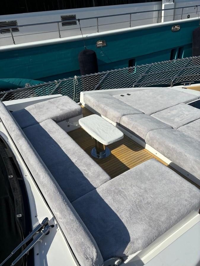 a large pool with a deck aboard ATLANTIS OF LONDON Yacht for Sale