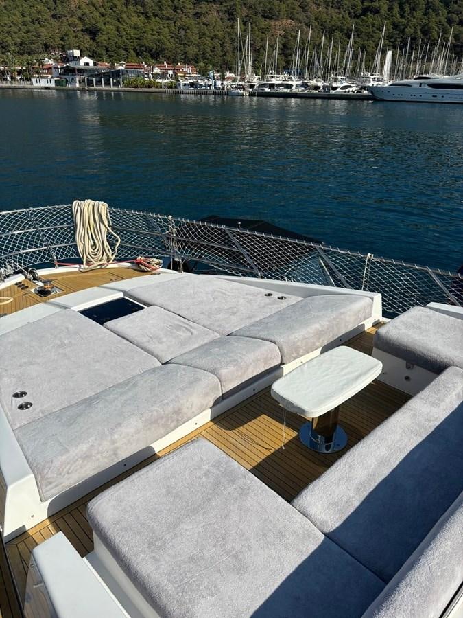 a deck with a view of a city and water aboard ATLANTIS OF LONDON Yacht for Sale