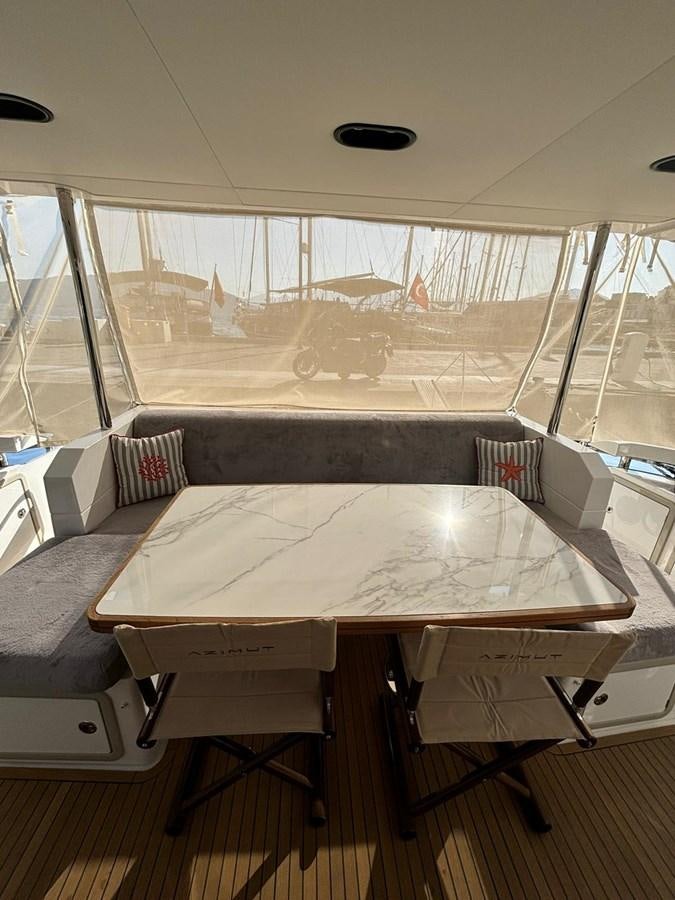 a large room with a large window aboard ATLANTIS OF LONDON Yacht for Sale