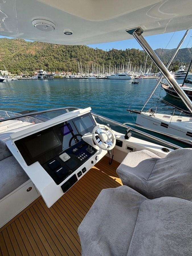 a boat on a deck aboard ATLANTIS OF LONDON Yacht for Sale