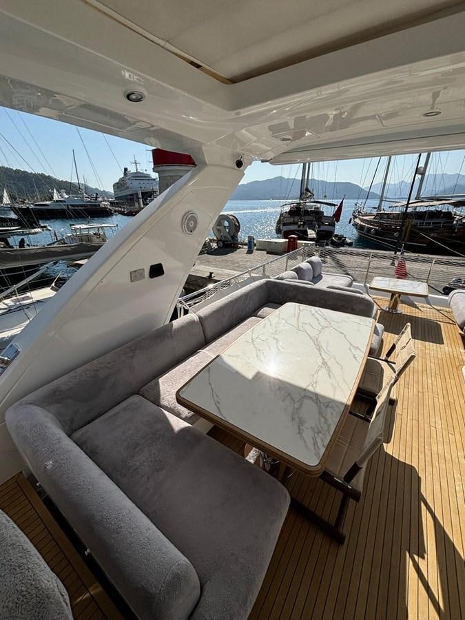 a boat with a white sheet on it aboard ATLANTIS OF LONDON Yacht for Sale