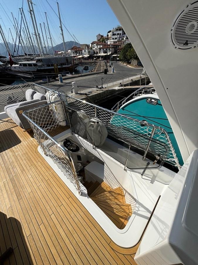 a boat docked at a pier aboard ATLANTIS OF LONDON Yacht for Sale