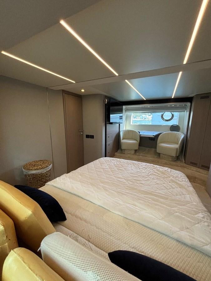 a bed in a room aboard ATLANTIS OF LONDON Yacht for Sale