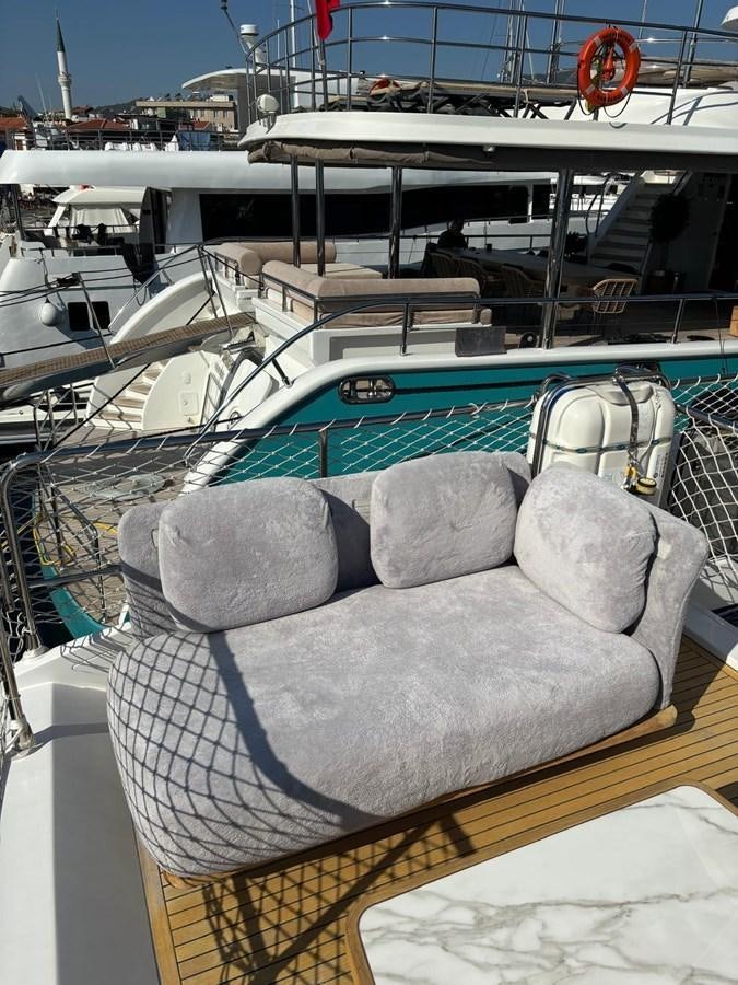 a boat with a large cushion aboard ATLANTIS OF LONDON Yacht for Sale