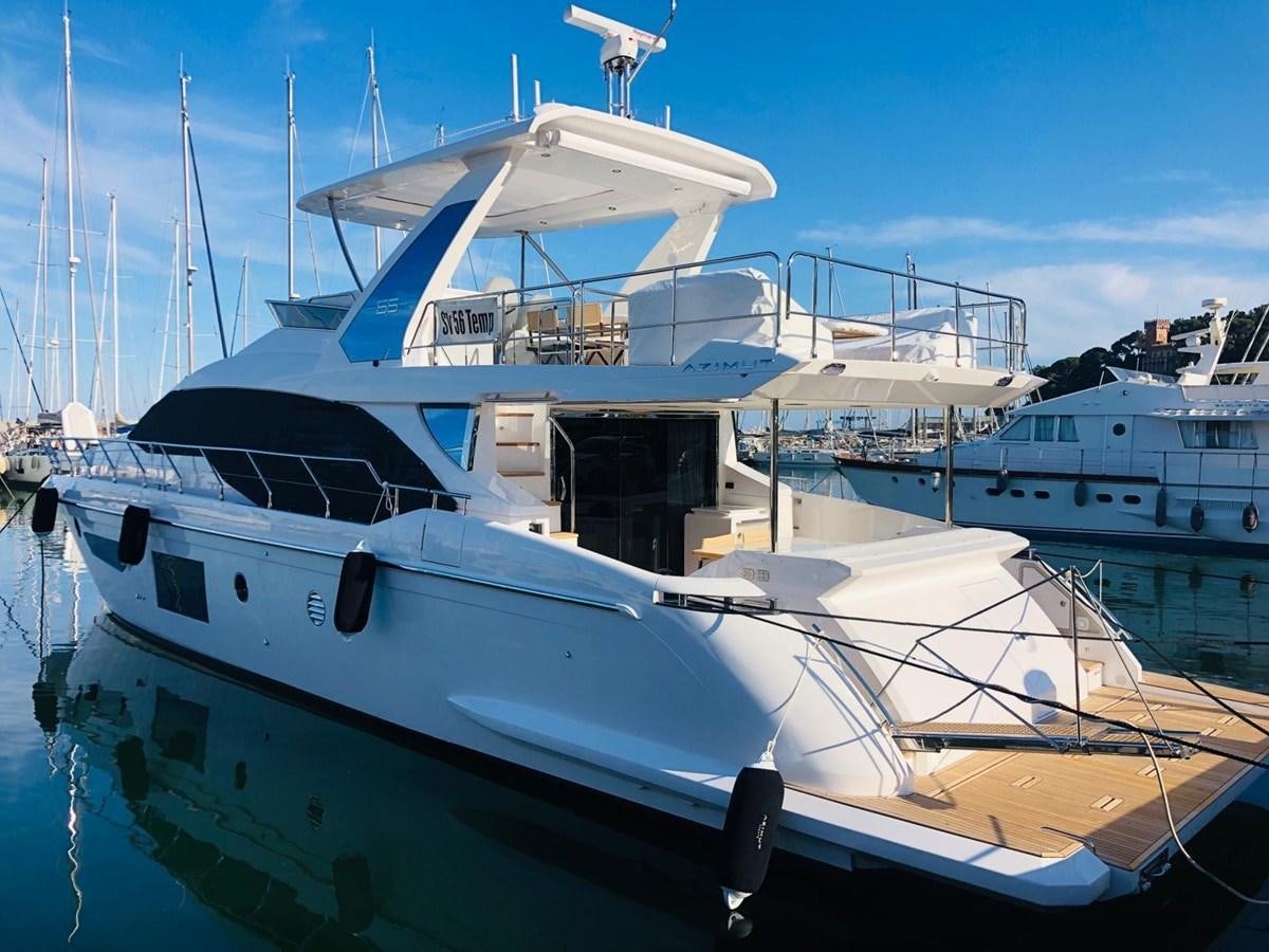 a boat docked at a pier aboard ATLANTIS OF LONDON Yacht for Sale