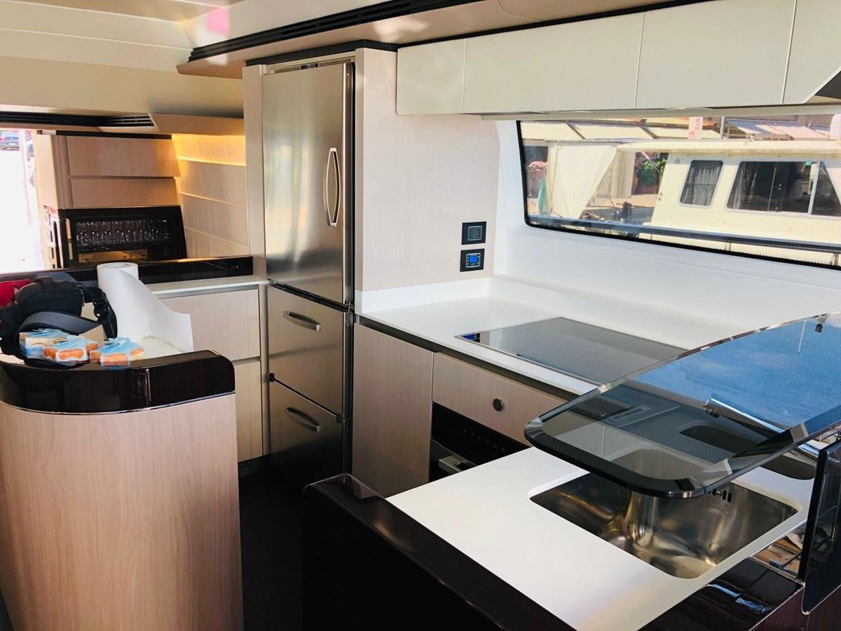a kitchen with a large oven aboard ATLANTIS OF LONDON Yacht for Sale