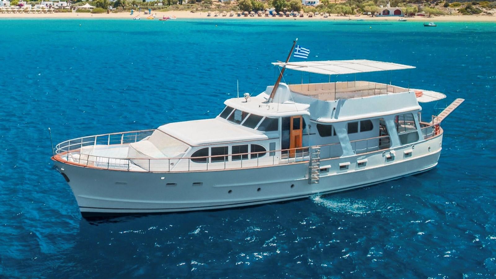 a white boat on the water aboard PRINCESS SOFIA Yacht for Sale