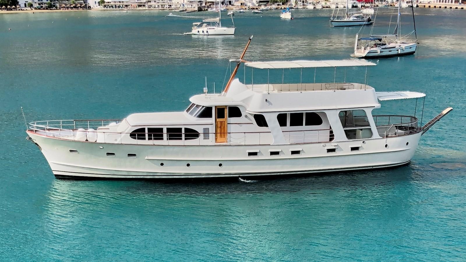 a white boat in the water aboard PRINCESS SOFIA Yacht for Sale