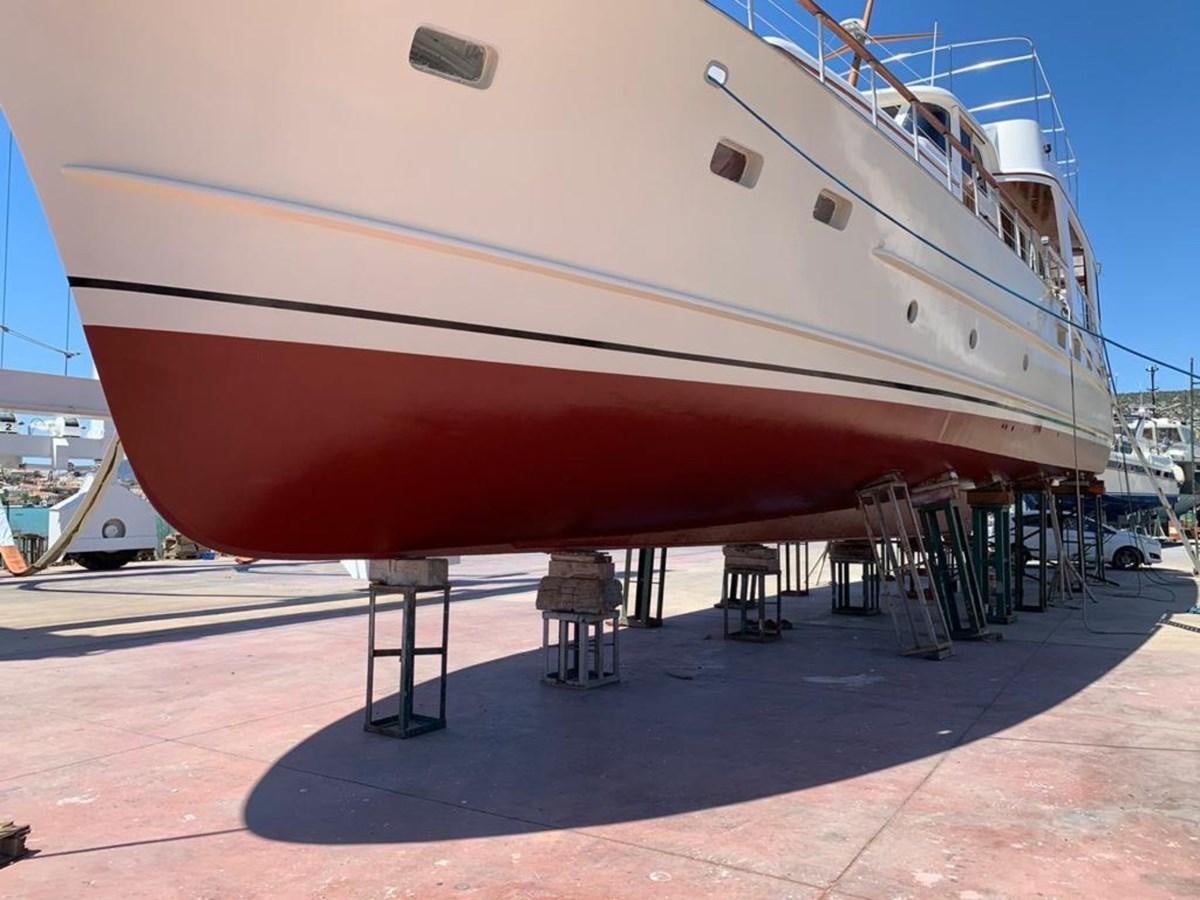 a large white boat in a harbor aboard PRINCESS SOFIA Yacht for Sale