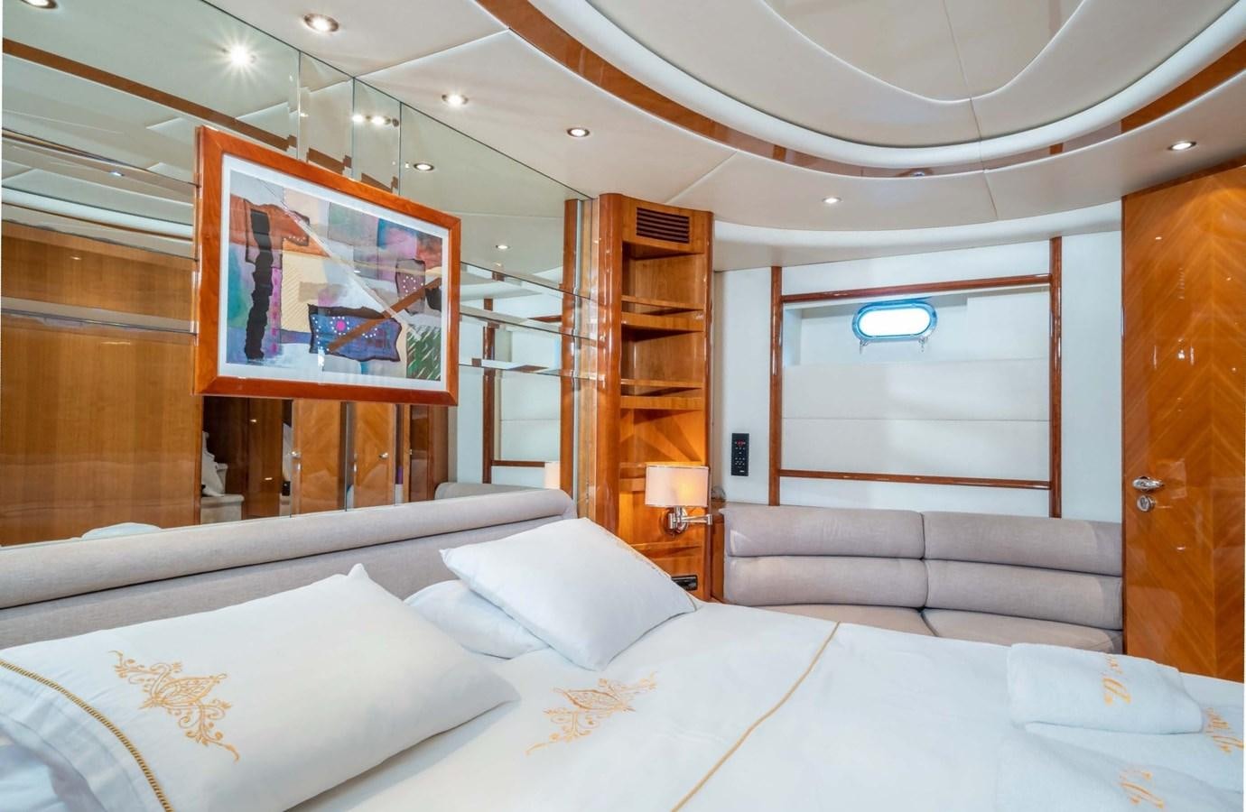 a room with a bed and a window aboard D FLAWLESS Yacht for Sale