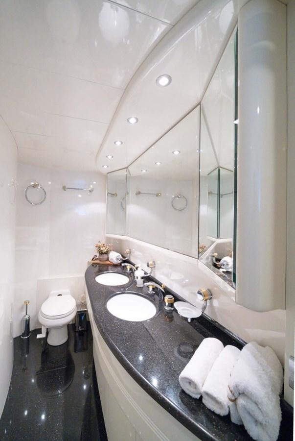 a bathroom with a large mirror aboard D FLAWLESS Yacht for Sale