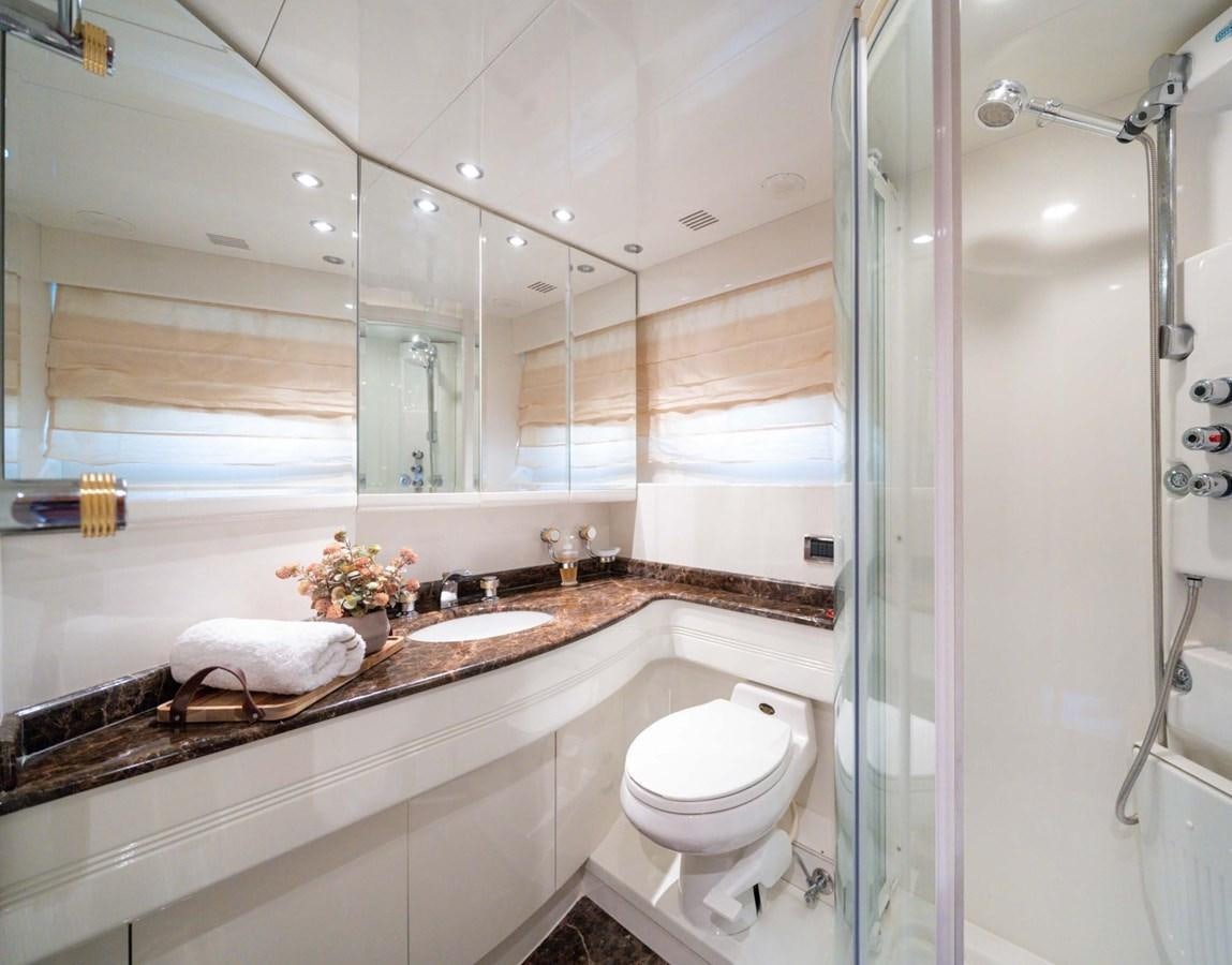 a bathroom with a glass shower aboard D FLAWLESS Yacht for Sale