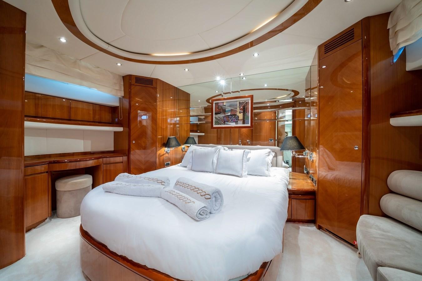 a large bedroom with a large bed aboard D FLAWLESS Yacht for Sale