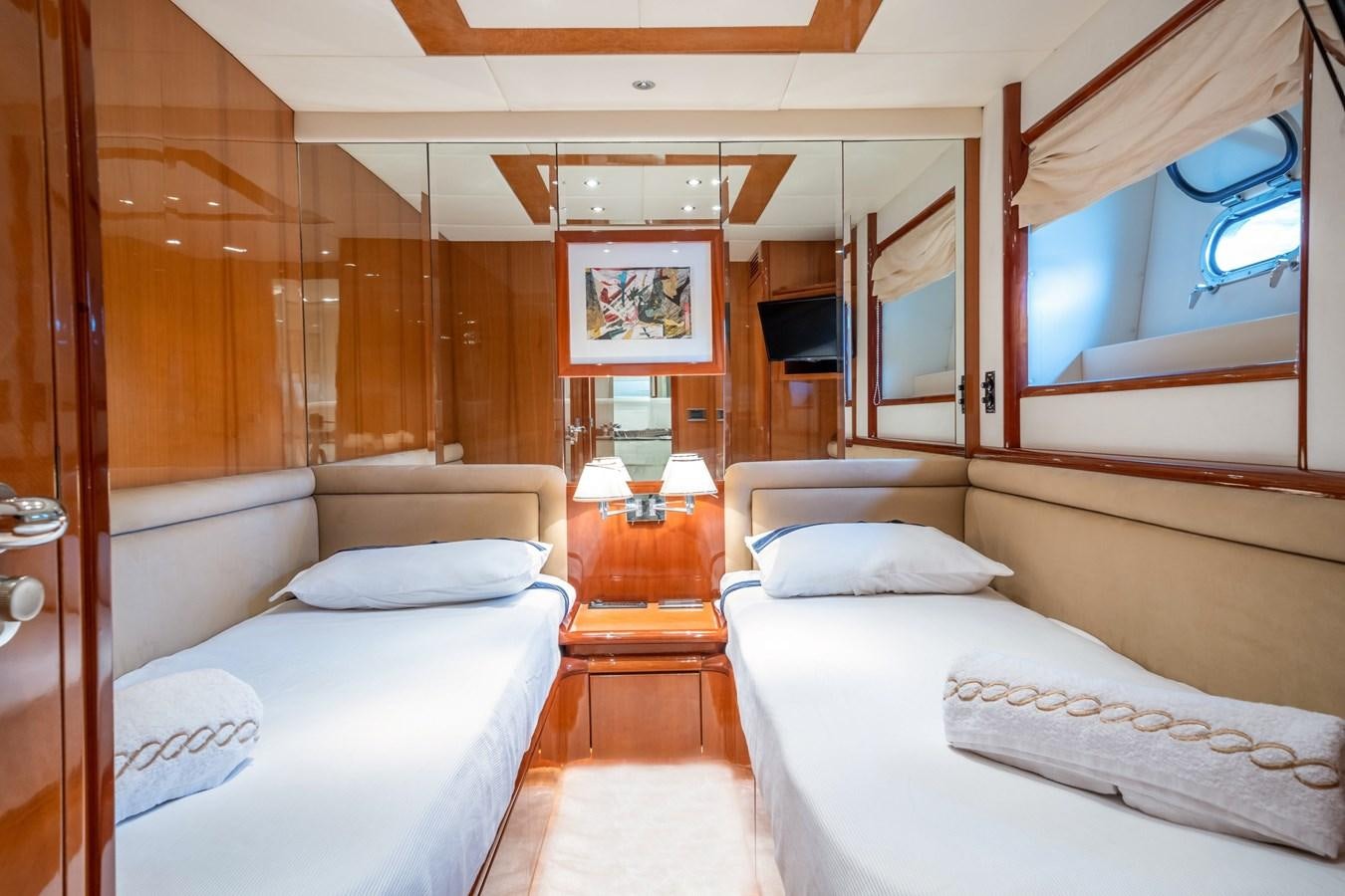 a room with two beds aboard D FLAWLESS Yacht for Sale