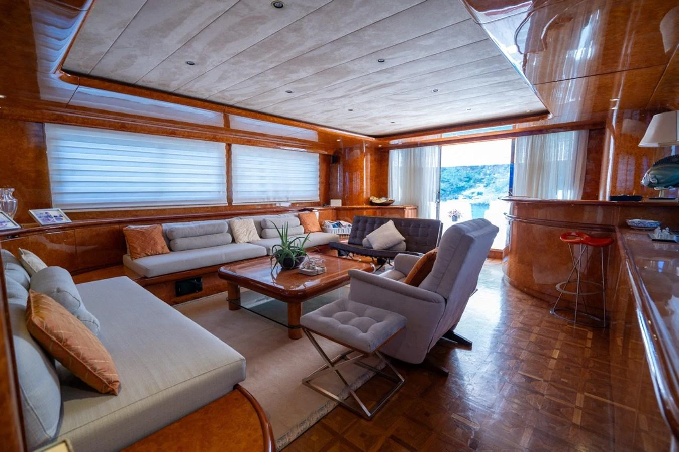 a living room with a large window aboard ADMIRAL 27 M Yacht for Sale