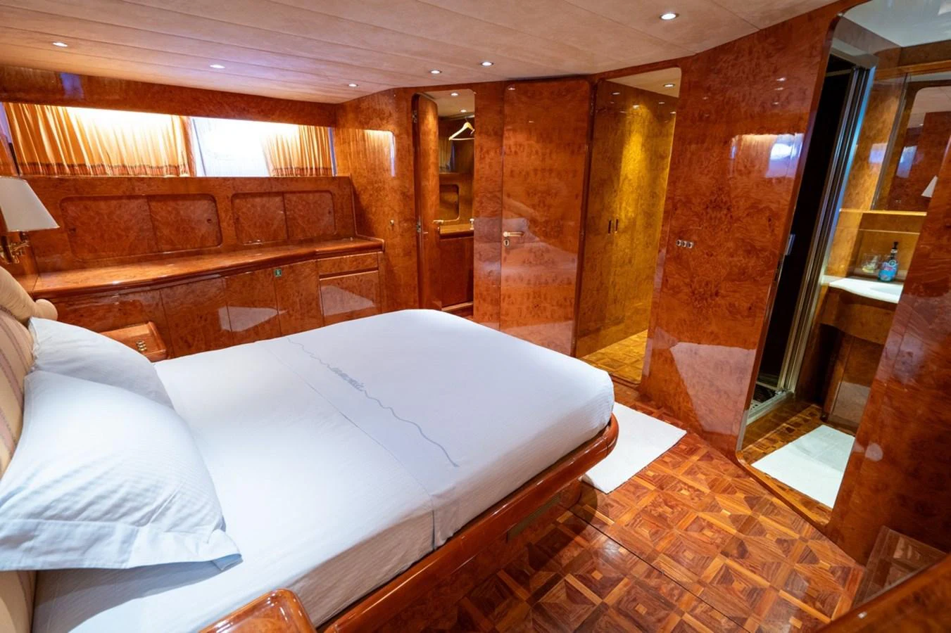 a bed in a room aboard ADMIRAL 27 M Yacht for Sale