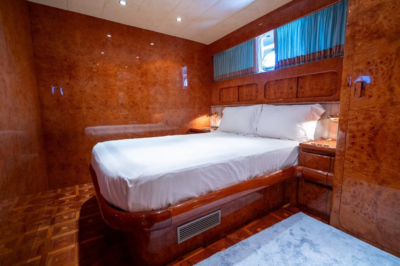 a bed in a room aboard ADMIRAL 27 M Yacht for Sale