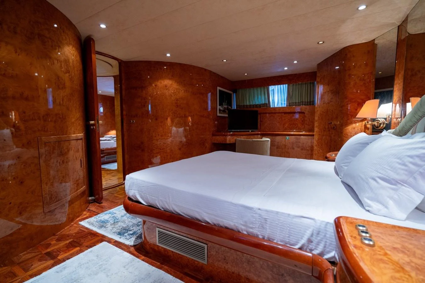a bed in a room aboard ADMIRAL 27 M Yacht for Sale