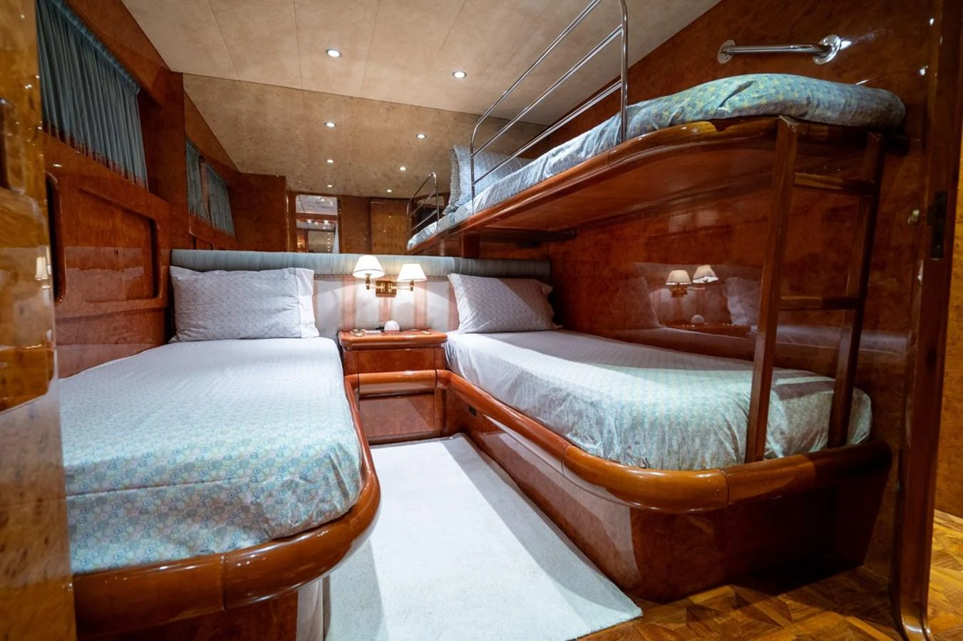 a couple of beds in a room aboard ADMIRAL 27 M Yacht for Sale