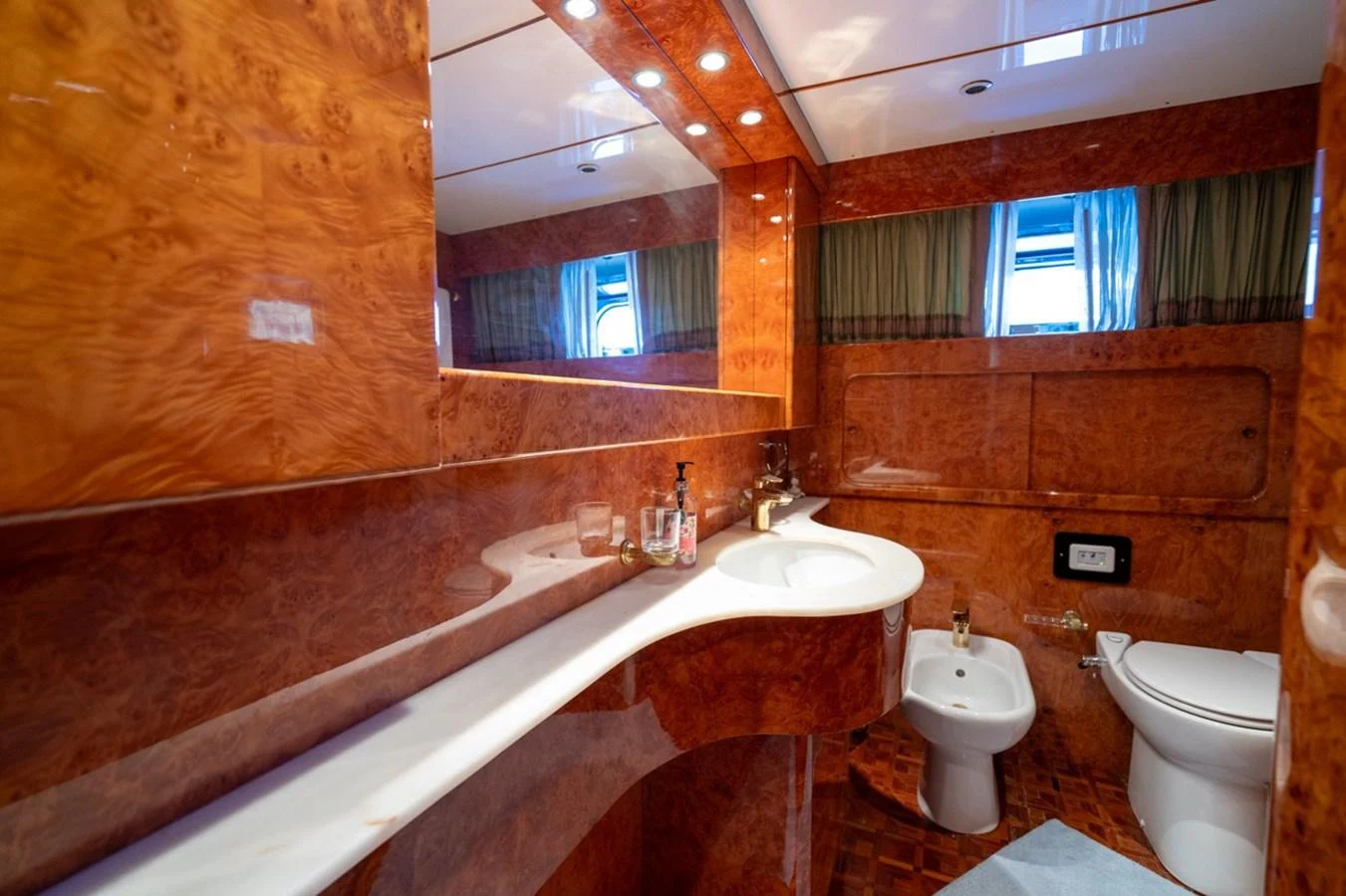 a bathroom with a sink and a toilet aboard ADMIRAL 27 M Yacht for Sale