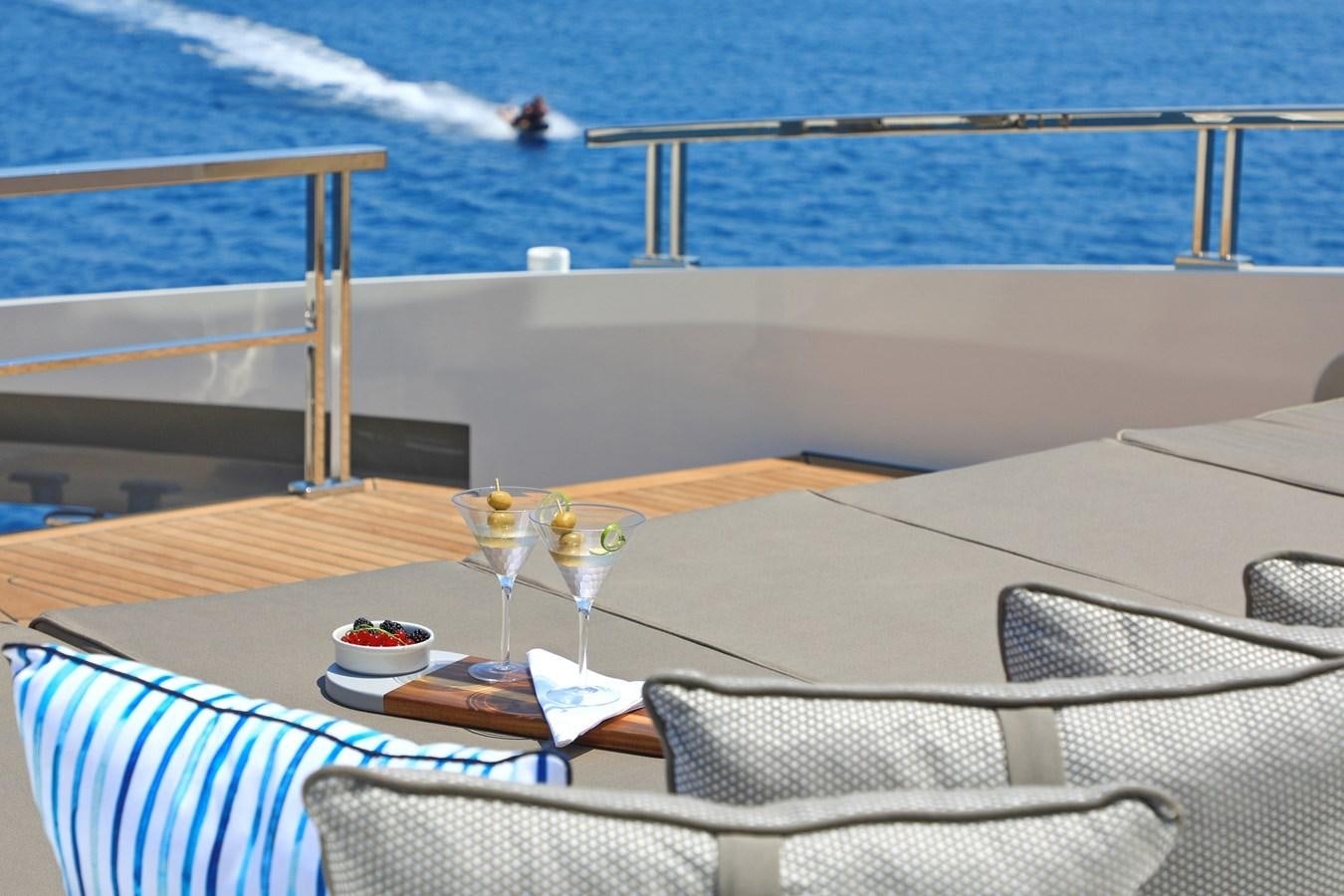 a table with drinks on it aboard TORTURA Yacht for Sale
