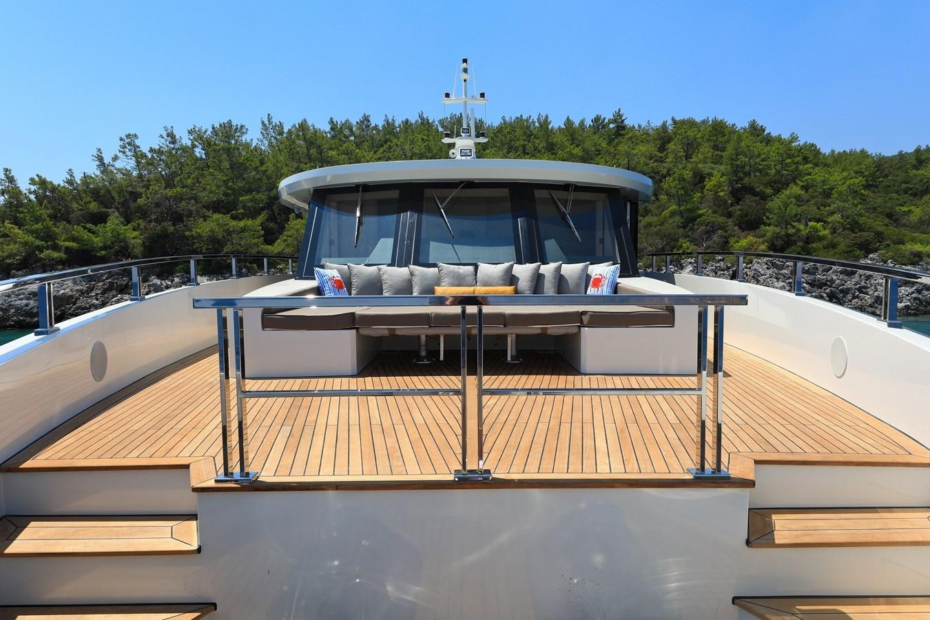 a boat on a dock aboard TORTURA Yacht for Sale