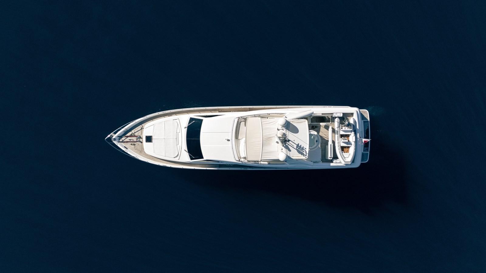 a blue and white car aboard LADY HELENA Yacht for Sale