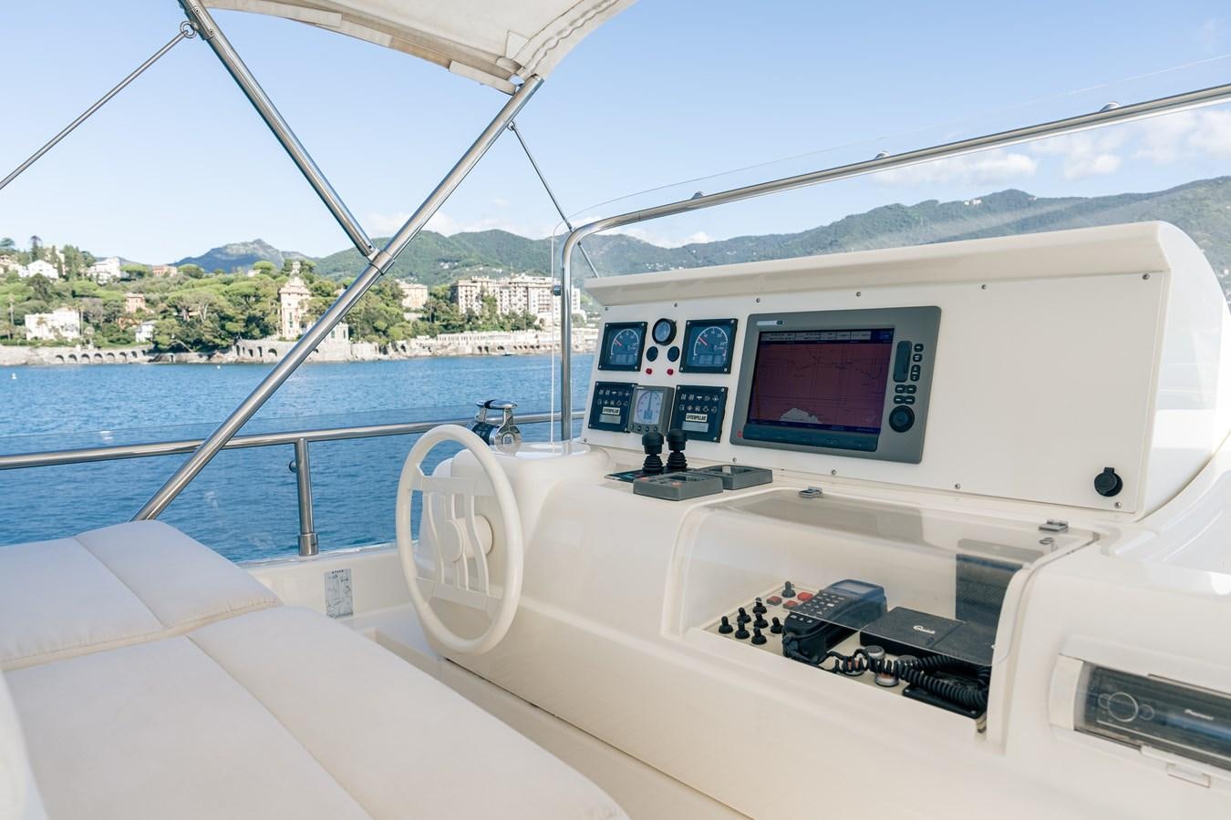a boat with a screen and a laptop on it aboard LADY HELENA Yacht for Sale
