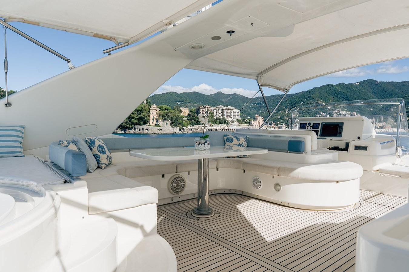 a white boat on a deck aboard LADY HELENA Yacht for Sale