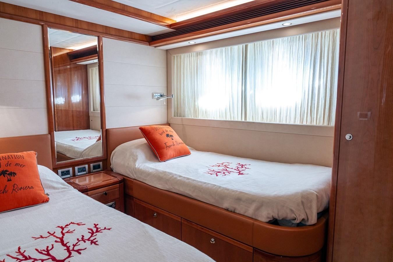 a couple of beds in a room aboard LADY HELENA Yacht for Sale