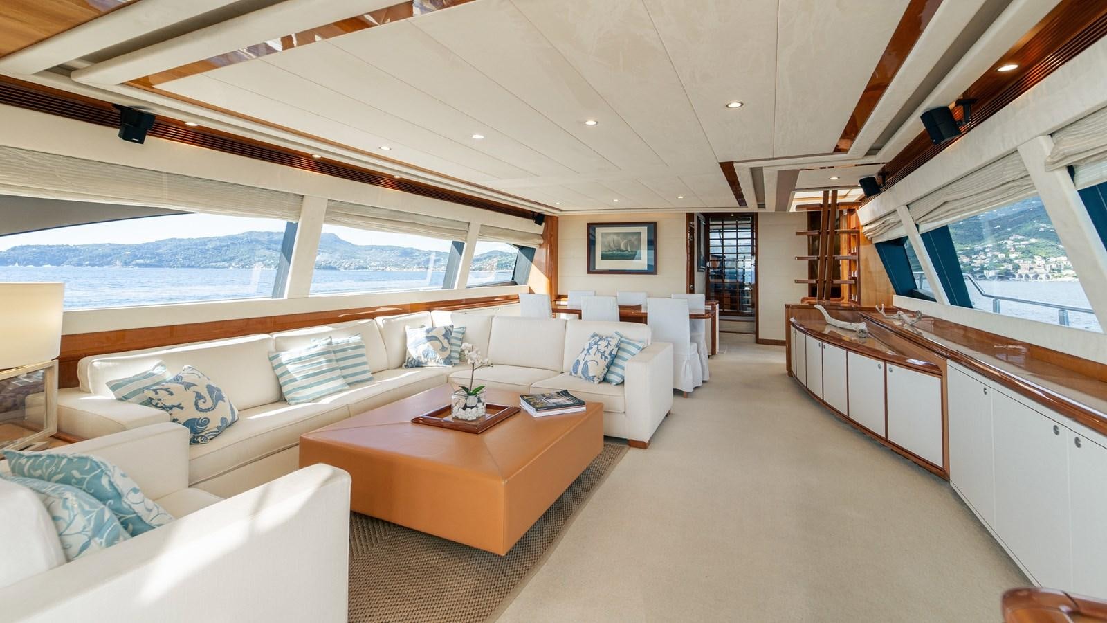 a living room with a large window aboard LADY HELENA Yacht for Sale